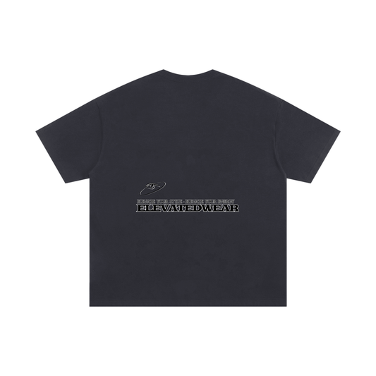 Black t-shirt with white text on a white background
