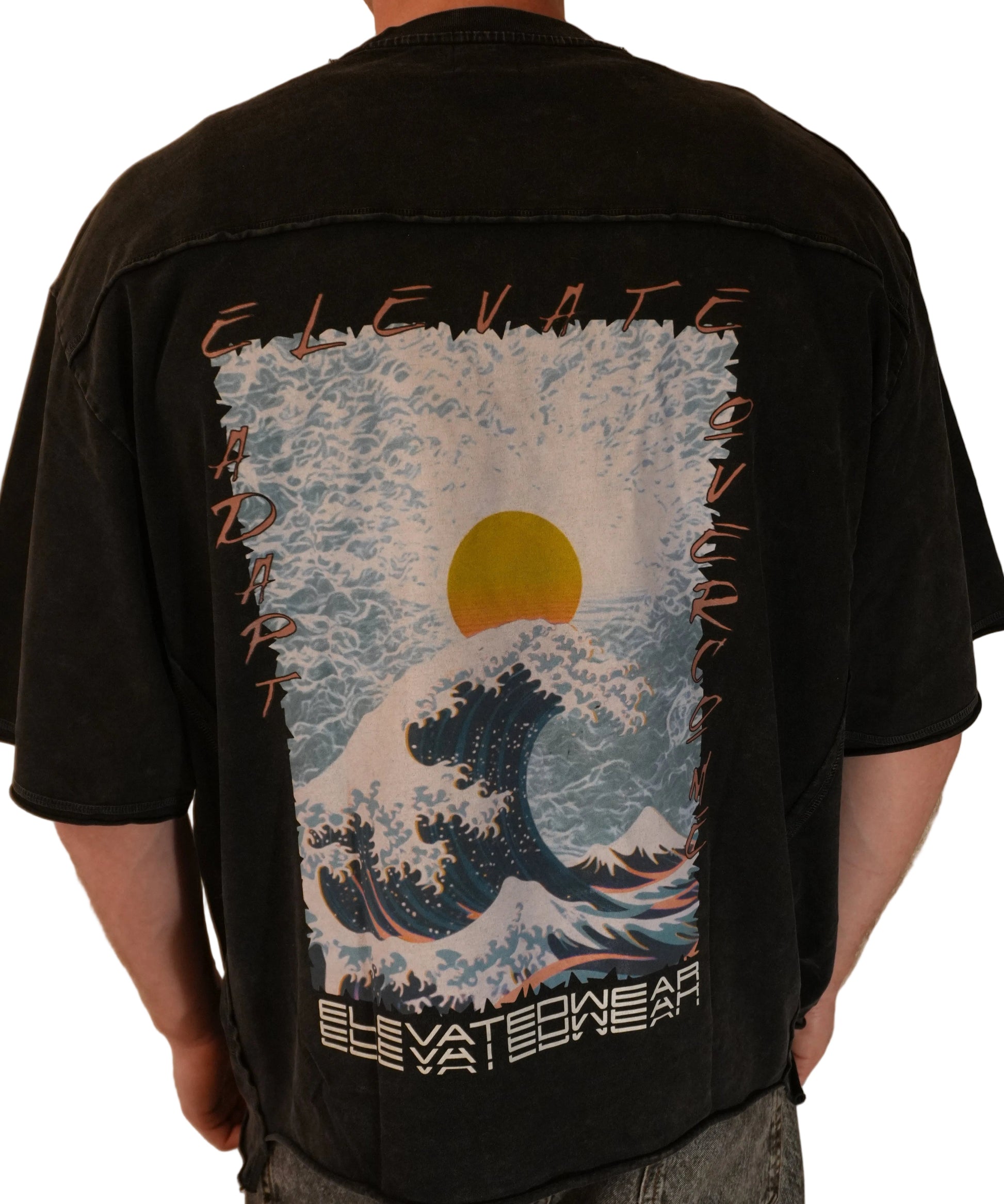 Black backpack with a design of a wave and sun held by a person.