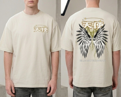 Man wearing a beige t-shirt with angel wings design on the back, standing in a minimalistic indoor setting.