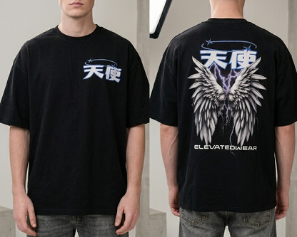 Person wearing a black t-shirt with angel design and text, standing in a modern indoor setting.