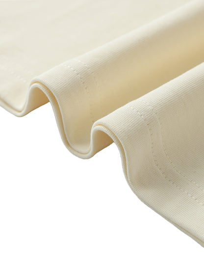 Close-up of beige fabric with a white background